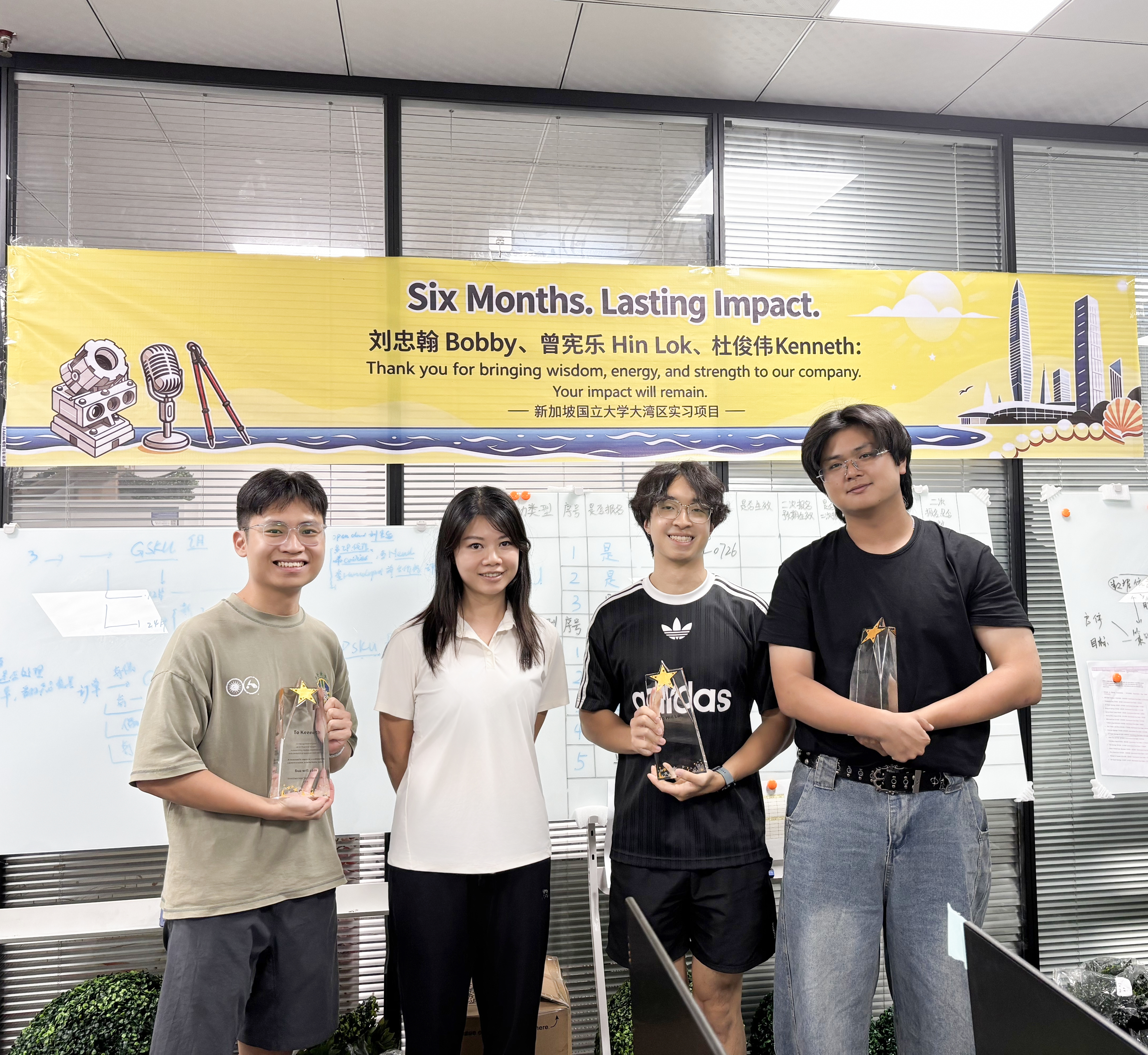 Kenneth, Hin Lok, and Bobby with Heidi at their Sea-will internship appreciation